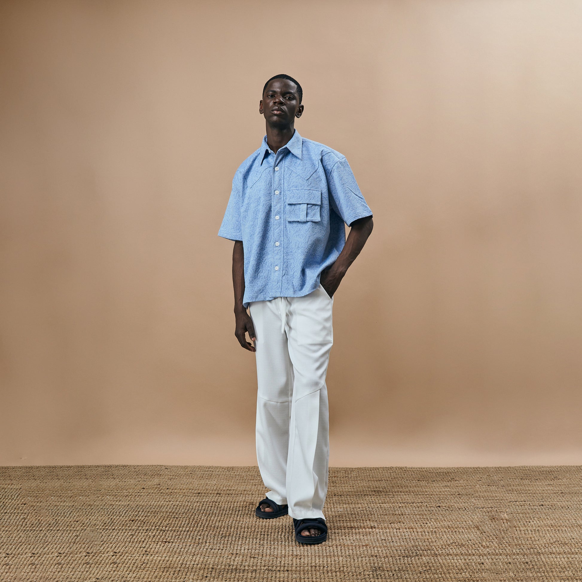 PLEATED ARCH CUT PANTS- PEARL WHITE