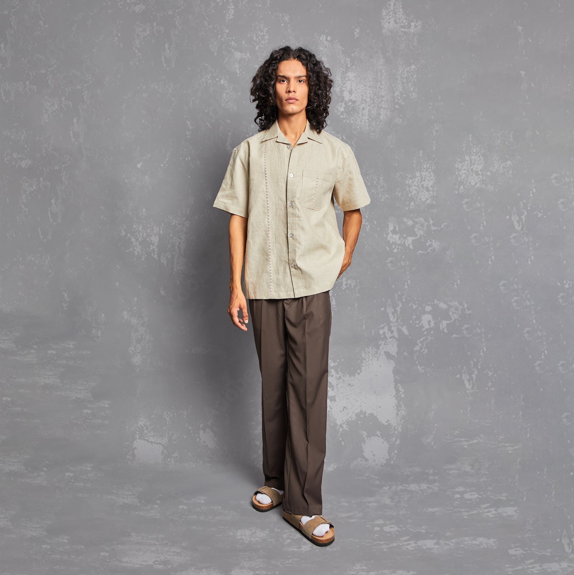 model, editorial, aesthetic. buttoned up shirt, shirt for men, womenswear styling, straight fit, laced up detail, pocket detailing, people also ask