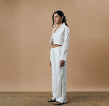 PLEATED ARCH CUT PANTS- PEARL WHITE