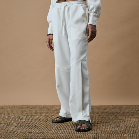 PLEATED ARCH CUT PANTS- PEARL WHITE