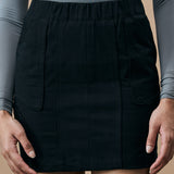 WARPED PANEL SKIRT- CARBON BLACK