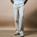 PLEATED ARCH CUT PANTS - BISCUIT
