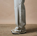 PLEATED ARCH CUT PANTS - BISCUIT
