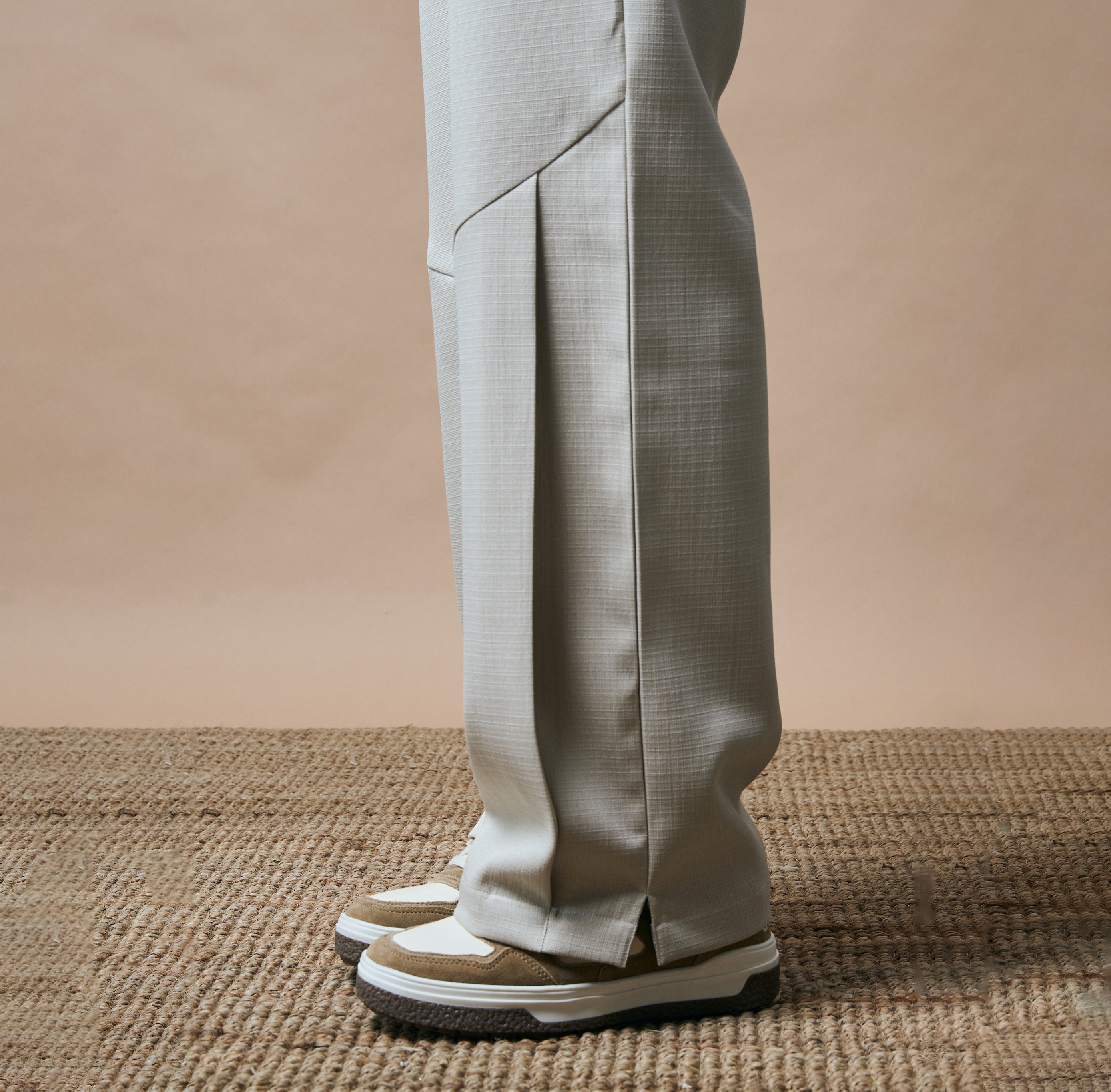 PLEATED ARCH CUT PANTS - BISCUIT