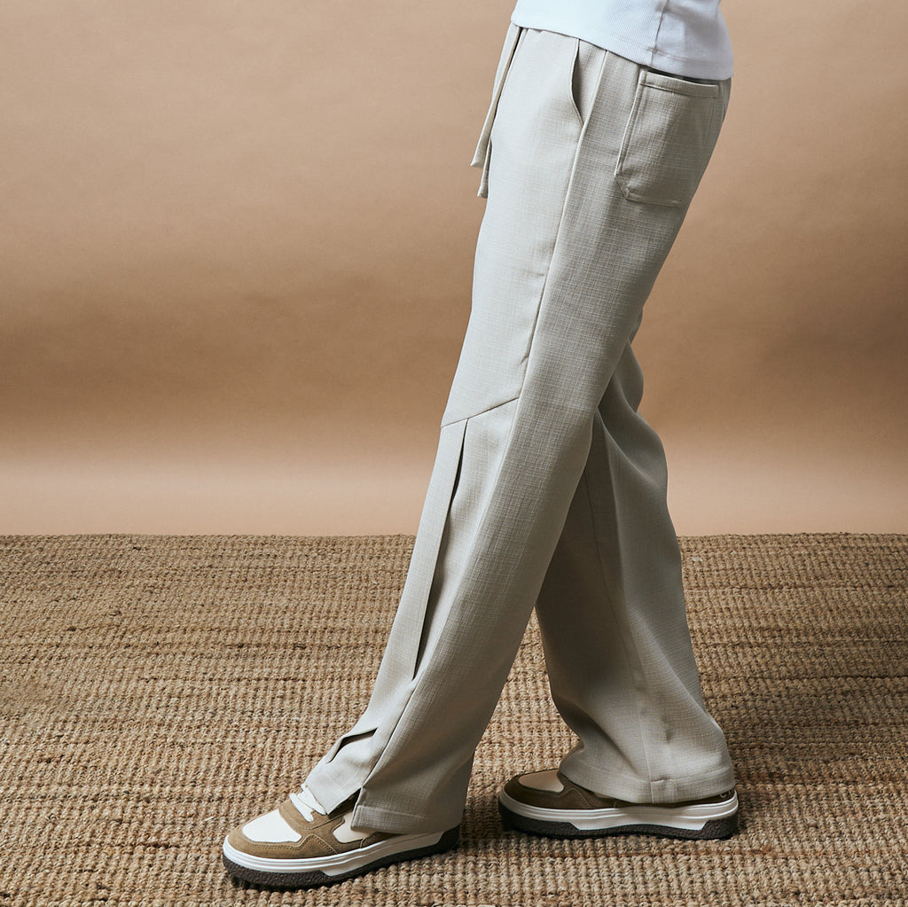 PLEATED ARCH CUT PANTS - BISCUIT