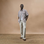 PLEATED ARCH CUT PANTS - BISCUIT