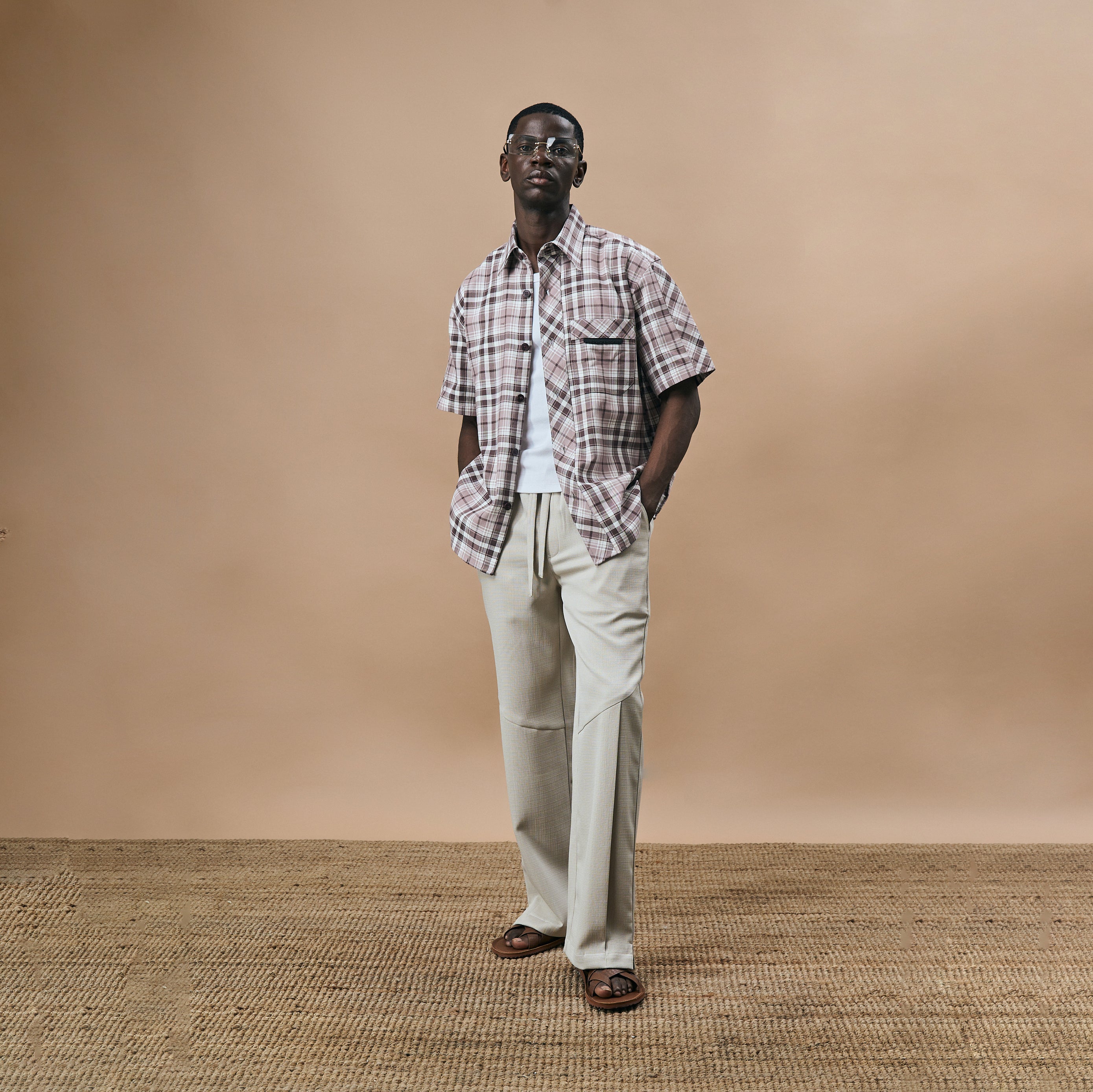 PLEATED ARCH CUT PANTS - BISCUIT