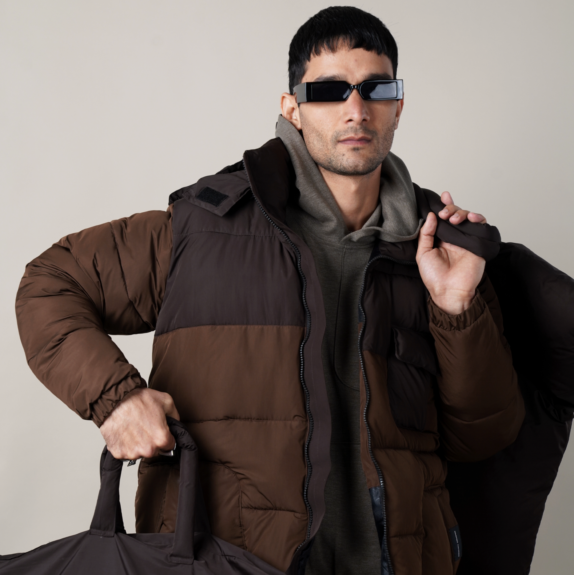 WINTER, WINTER ESSENTIAL, WARPING THEORIES, The WT Puffer Jacket, monochromatic colUor palette,  jetted patch pocket, angular zipped welt pockets, light weight material, detachable hood and a long collar, UNISEX , RELAXED FIT,  WIND PROOF, WATER REPELLENT, BROWN PUFFER, BROWN PUFFER JACKET, BROWN PUFFER JACKET NORTHFACE, BROWN PUFFER JACKET MENS, PUFFER VEST, BROWN PUFFER WARPING THEORIES, people also ask 
