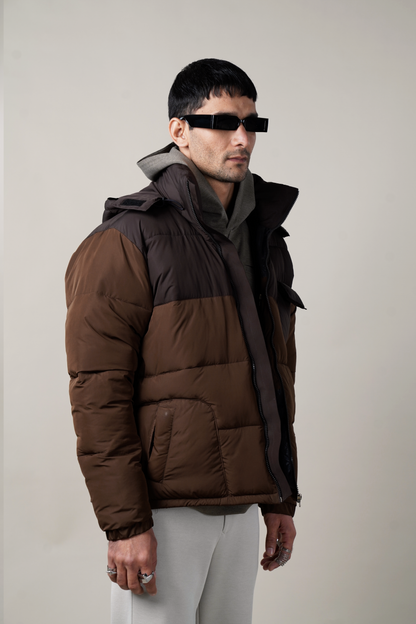 UTILITY CLOTHING, ESSENTIAL, WINTER ESSENTIAL, BROWN PUFFER VEST, TWO TONE, TWO TONES PUFFER, Puffer Jacket, monochromatic colour palette,  jetted patch pocket, angular zipped welt pockets, light weight material, detachable hood and a long collar, UNISEX , RELAXED FIT,  WIND PROOF, WATER REPELLENT, BROWN PUFFER, BROWN PUFFER JACKET, BROWN PUFFER JACKET NORTH FACE, BROWN PUFFER JACKET MENS, PUFFER VEST, BROWN PUFFER WARPING THEORIES, people also ask 