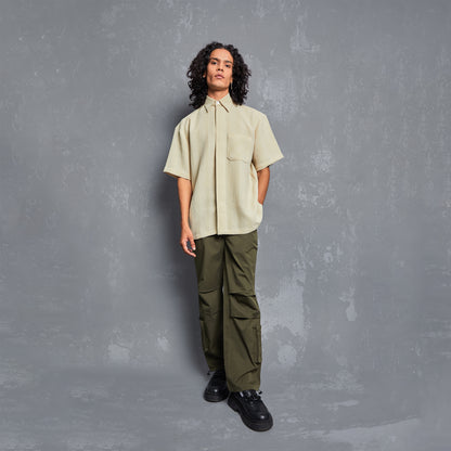 editorial, lookbook, 100% polyester fabric, textured polyester fabric, lightweight polyester fabric, inega, inega india, warping theories, unisex, warping theories india, summer outfit inspiration, cargos, moderate olive cargos, olive cargo pants, shirts withj pants, mens shirts styled with cargo pants, people also ask 